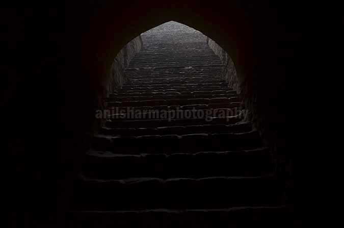 Monuments: Agrasen ki Baoli or Stepwell at New Delhi - The deepest section of the Agrasen ki Baoli at Hailey Road near Connaught Place, New Delhi, India by Anil