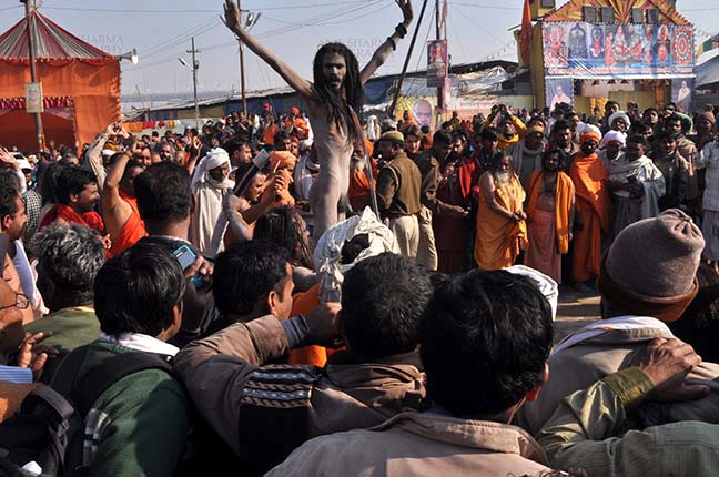 Religion- Naga Sadhu\u2019s at Mahakumbh (India) - Naga sadhu's at procession at Mahakumbh Allahabad, Uttar Pradesh, India. by Anil
