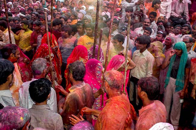 Festivals- Lathmaar Holi of Barsana (India) - Lagre number of people gathered to celebrate Lathmaar Holi at Barsana, Mathura, Uttar Pradesh, India. by Anil