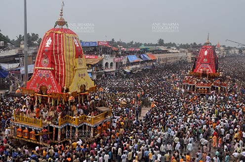 Festivals- Jagannath Rath Yatra (Odisha) - Procession of the glorious chariots of Lord Balbhadra and Lord Jagannath, accompanied by thousands of excited pilgrims, for Jagannath Rath Yatra festival at Puri, Odisha, India. by Anil