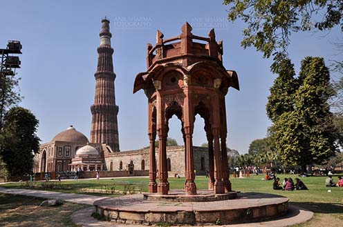 Monuments- Qutab Minar, New Delhi, India. - A Red sendstone Bengal style chhattri or MajorRobert Smith’s Folly, Qutub Minar and Alai Darwaza at Qutub Minar Complex, Mehrauli, New Delhi, India. by Anil