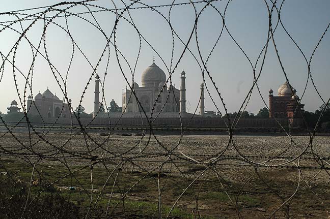 Monuments- Taj Mahal, Agra (India) - Barbed-wire fencing at Taj Mahal to protect it from terrorist attacks. by Anil