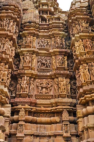 Monuments-  Khajuraho Temples (Madhya Pradesh) - Carving on a temple wall in the complex built by the Chandela dynasty 1000 year ago, a World Heritage site famed for erotica. by Anil