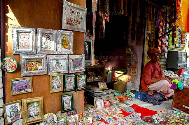 Festivals- Lathmaar Holi of Barsana (India) - A religious paintings and material shop at Barsana, Mathura, Uttar Pradesh, India. by Anil