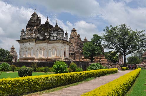Monuments-  Khajuraho Temples (Madhya Pradesh) - Parvati temple with blue sky at Khajuraho, Madhya Pradesh, India by Anil