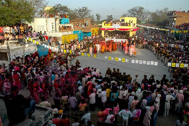 Festivals- Lathmaar Holi of Barsana (India) - Local people celebrating Holi festival at Nandgoan Mathura, Uttar Pradesh, India. by Anil