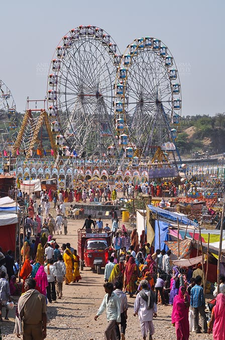 Fairs- Baneshwar Tribal Fair - Baneshwar, Dungarpur, Rajasthan, India- February 14, 2011: Joy ride on Ferris wheel is the other attraction for the tourists and devotees at Baneshwar, Dungarpur, Rajasthan, India. by Anil