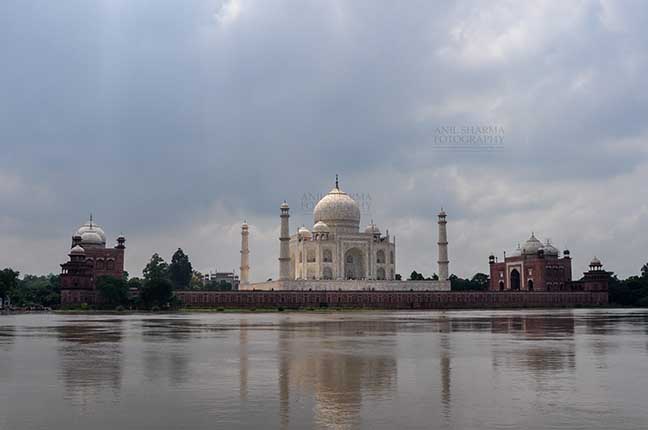 Monuments- Taj Mahal, Agra (India) - Taj Mahal in rainy season with flooded river Yamuna water all arround at Agra, Uttar Pradesh, India. by Anil