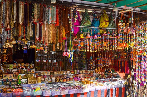 Fairs- Pushkar Fair (Rajasthan) - Pushkar, Rajasthan, India- May 23, 2008: Necklaces, beads, jewelry, gemstones, bracelets, earrings, bangles at Pushkar fair, Rajasthan, India. by Anil