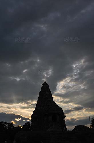 Monuments-  Khajuraho Temples (Madhya Pradesh) - A sunset view of Kandariya Mahadeva Hindu temple at Khajuraho in Madhya Pradesh, India. by Anil