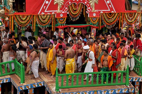 Festivals- Jagannath Rath Yatra (Odisha) - The religious custom of Gajpati king wearing the outfit of a sweeper and sweeping the chariot before the commencement of the rath yatra, for Jagannath Rath Yatra festival at Puri, Odisha, India. by Anil