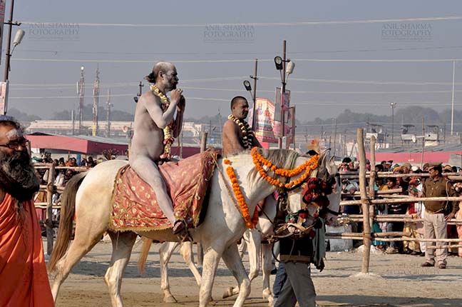 Religion- Naga Sadhu\u2019s at Mahakumbh (India) - Naga sadhu on horseback at Mahakumbh Allahabad, Uttar Pradesh, India. by Anil