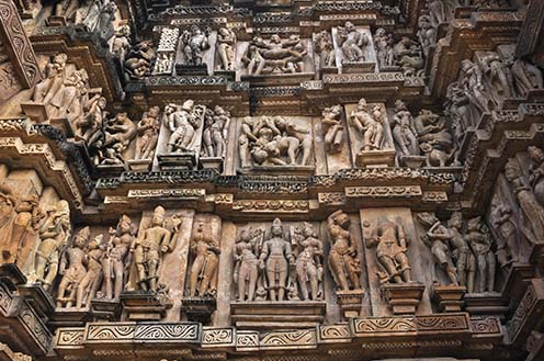 Monuments-  Khajuraho Temples (Madhya Pradesh) - Erotic art at Khajuraho temple India- Ancient erotic carvings sculptures Kama Sutra tantric sexual pratices. by Anil