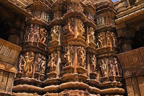 Monuments-  Khajuraho Temples (Madhya Pradesh) - Stone carved sculptures of Hindu Gods at Khajuraho temple, Madhya Pradesh, India. by Anil