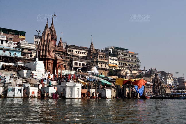 Travel- Varanasi the city of light (India) - Manikarnika Ghats is the main Traditional Hindu Cremation place where Hindu bodies are cremated at Varanasi, Uttar Pradesh, India. by Anil