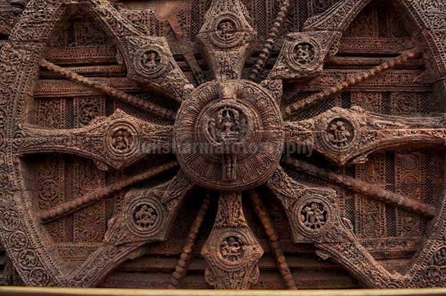Monuments- Sun Temple Konark (Orissa) - One of the highly ornate carved wheels of Sun temple at Konark, Orissa, India. by Anil