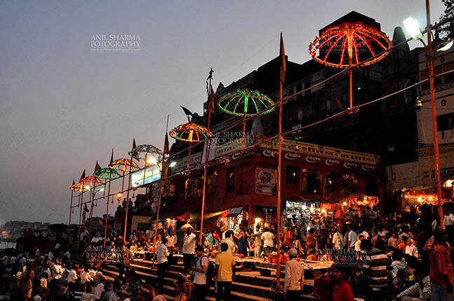 Travel- Varanasi the city of light (India) - Devotees waiting for evening aarti at Varanasi, Uttar Pradesh, India. by Anil
