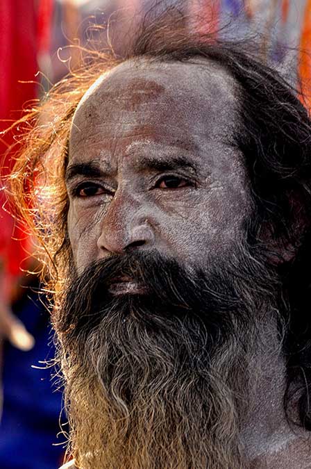 Culture- Naga Sadhu\u2019s (India) - Close-up of a Naga Sadhu having Holy ash on his face in Varanasi. by Anil