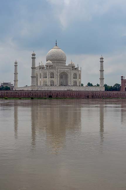 Monuments- Taj Mahal, Agra (India) - The Beauty of Taj Mahal in rainy season with flooded river Yamuna water all arround at Agra, Uttar Pradesh, India. by Anil