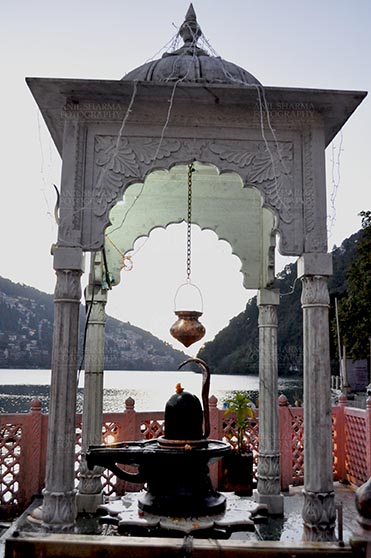 Travel- Nainital (Uttarakhand) - Nainital, Uttarakhand, India- November 11, 2015: Shivling at Naina Devi Temple, the temple devoted to Maa Naina Devi is situated right on Naini Lake near Flat at Mallital, Nainital, Uttarakhand India. by Anil