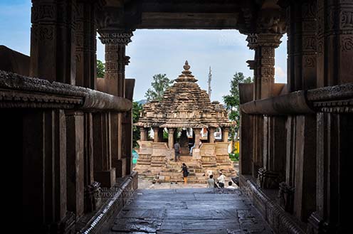 Monuments-  Khajuraho Temples (Madhya Pradesh) - Ancient stone carving work on Nandi Devar Temple at Khajuraho a UNESCO World Herigate Site, Madhya Pradesh, India. by Anil