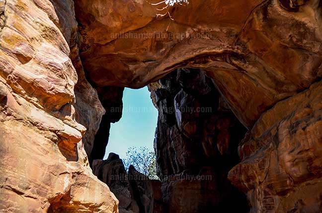 Archaeology- Bhimbetka Rock Shelters (India) - Interior of a cave at Bhimbetka archaeological site at Raisen, Madhya Pradesh, India. by Anil