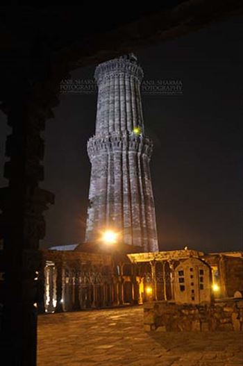 Qutub Minar Complex in night at Mehrauli Archaeological Park, New Delhi, India.