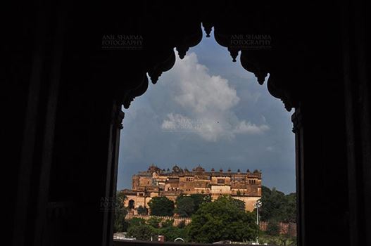 Orchha, Madhya Pradesh, India- August 20, 2012: Jahangir Mahal, Citadel of Jahangir, viewed from Chaturbhuj Temple, Orchha, Madhya Pradesh, India.