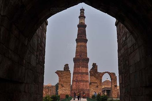 Qutab Minar, minaret tower with verses from Holy Quran at Qutab Minar Complex, New Delhi, India.
