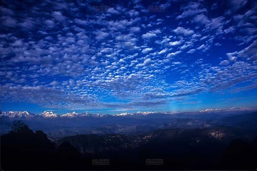 Sky with Clouds, Binsar, Uttarakhand, India- 14 December, 2006: Dark Blue color sky with clouds, at Binsar, Uttarakhand, India.