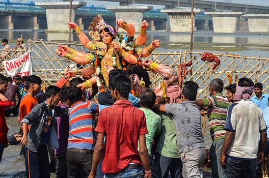 Durga Puja Festival, New Delhi, India-September 30, 2017: The Idol of Goddess Durga before the final immersion into the river Yamuna at Kalindi Kunj, New Delhi, India.