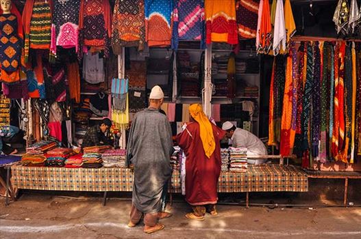 Religion- Dargah Sharif, Ajmer, Rajasthan (India) - Muslim man selling “Chhador” in a shop inside the Moinuddin Chishti Mausoleum (i.e. the “Dargah Sharif”)