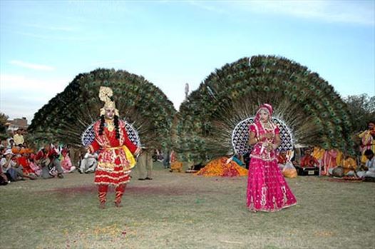 Rajasthani folk artist performing as Radha-Krishana Leela at Holi and Elephant Festival at jaipur, Rajasthan (India).
.