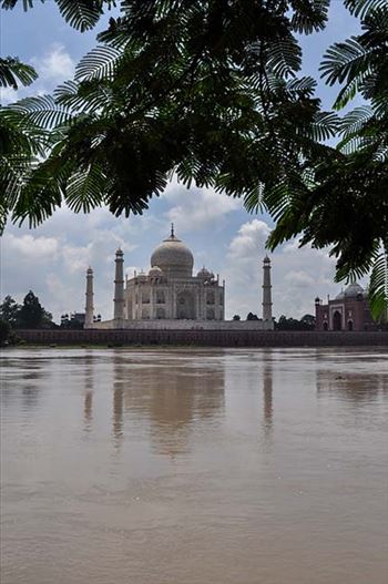 Taj Mahal in rainy season with flooded river Yamuna water all arround at Agra, Uttar Pradesh, India.