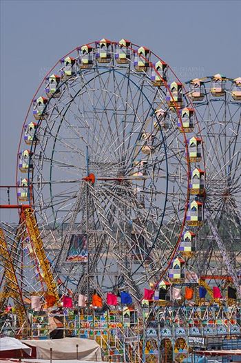 Baneshwar, Dungarpur, Rajasthan, India- February 14, 2011: Joy ride on Ferris wheel is the other attraction for the tourists and devotees at Baneshwar, Dungarpur, Rajasthan, India.