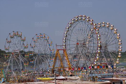 Fairs- Baneshwar Tribal Fair - Baneshwar, Dungarpur, Rajasthan, India- February 14, 2011: Joy ride on Ferris wheel is the other attraction for the tourists and devotees at Baneshwar, Dungarpur, Rajasthan, India.