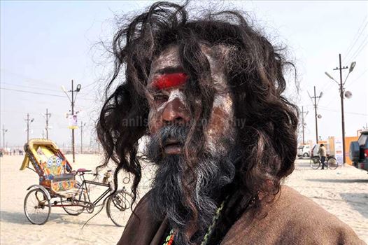 Long hair Aghori Sadhu wearing rudraksha bead at Mahakumbh, Allahabad, Uttar Pradesh, India.
