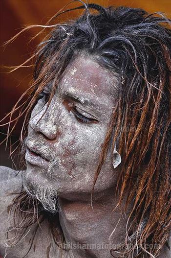 Culture- Naga Sadhu’s (India) - Close up of a young Naga Sadhu at Varanasi Ghat.