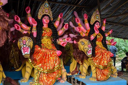 Festivals- Durga Puja Festival - Durga Puja Festival, Noida, Uttar Pradesh, India- September 20, 2017: Indian Goddess Durga’s clay idol in a workshop under Preparation for the traditional Durga Puja festival at Noida, Uttar Pradesh, India.