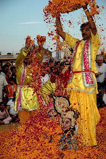 Festivals- Holi and Elephant Festival (Jaipur) - People sprinkling rose and merigold petals on Radha-Krishana at Holi and Elephant Festival at jaipur, Rajasthan (India).
.