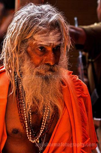 Close-up of an old Naga Sadhu wearing beads mala at Varanasi.