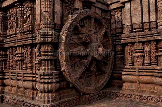 One of the highly ornate carved wheels of Sun temple at Konark, Orissa, India.