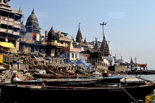 Travel- Varanasi the city of light (India) - The Manikarnika Ghats at the bank of Holy River Ganges is the main Traditional Hindu cremation place where Hindus bodies are cremated at Varanasi, Uttar Pradesh, India.